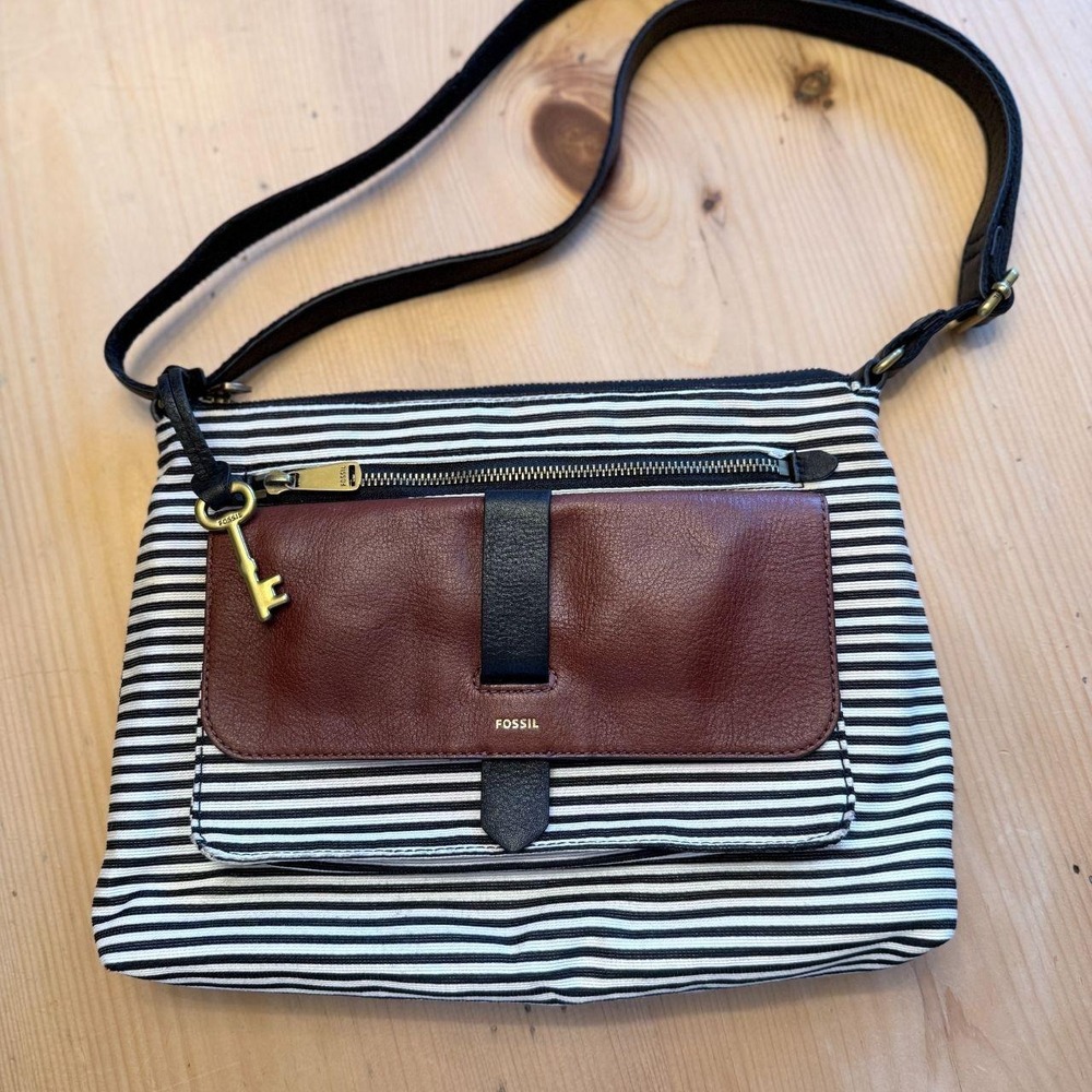 Fossil textured textile with leather trim.  Sharp black and white design